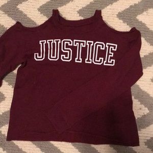 In style and maroon shirt